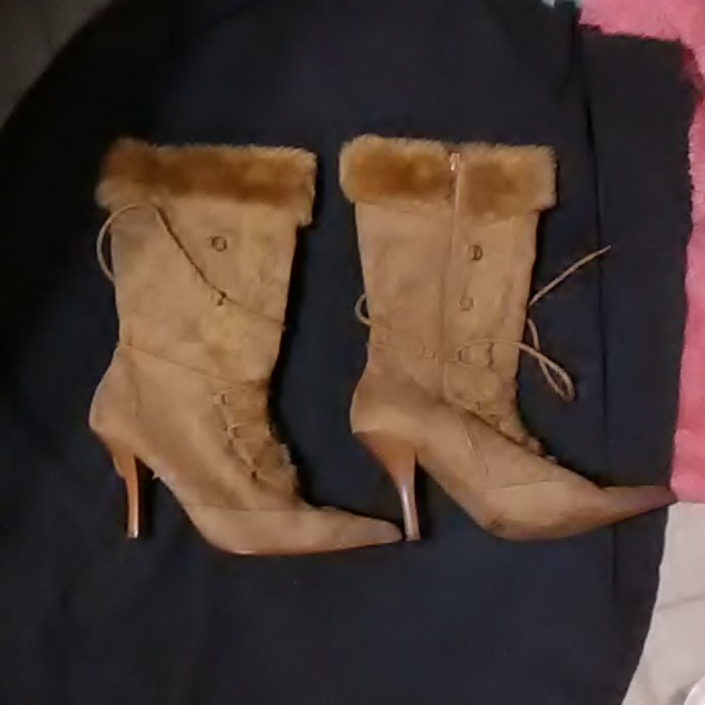 Tan heeled lace up boots with zippers